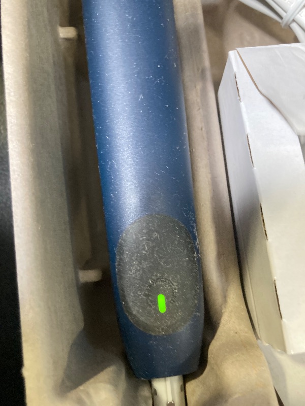 Photo 1 of Oral-B Rechargeable Electric Toothbrush, iO2, 3 Cleaning Modes, Automatic Pressure Sensor to Protect Gums, Dark Blue