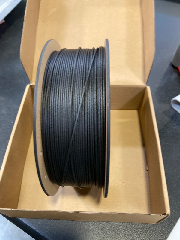 Photo 1 of ELEGOO PLA Filament 1.75mm Black 1KG, 3D Printer Filament Dimensional Accuracy +/- 0.02mm, 1kg Cardboard Spool(2.2lbs) 3D Printing Filament Fits for Most FDM 3D Printers
