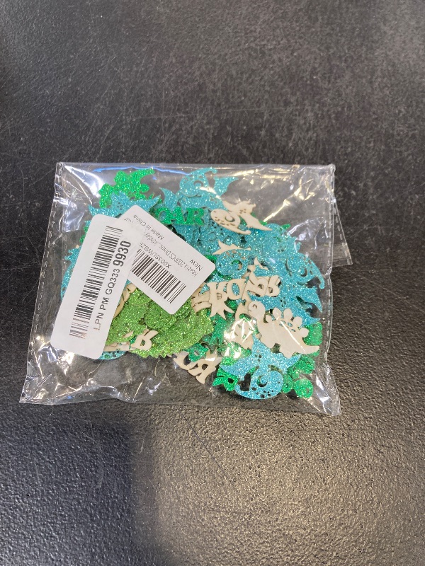 Photo 1 of 200Pcs Double-sided Glitter Dinosaur Confetti Dinosaurs Paper Confetti Cute Dino Roar Table Confetti for Boys Girls Dinosaur Birthday Party Baby Shower Table Decorations Dinosaurs Party Confettis