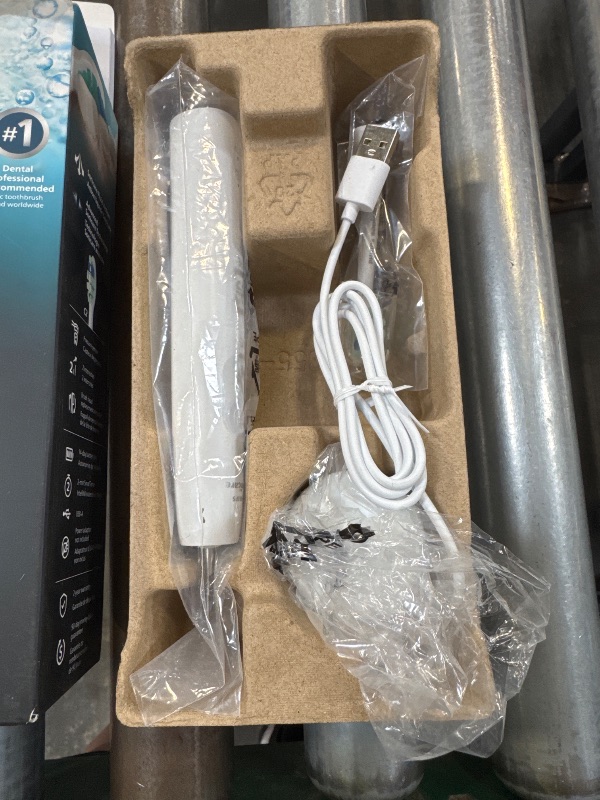 Photo 1 of Philips Sonicare 4100 Series Electric Toothbrush - Sonic Toothbrush with Advanced Sonic Technology, Pressure Sensor, Two Intensity Settings, Smartimer & Quadpacer, White, Model HX3681/23