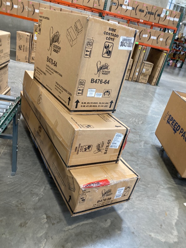 Photo 1 of Ashley Caitbrook Caitbrook Queen HEADBOARD Storage Rails and Footboard B476-98----COMPLETE BED FRAME PLEASE BRING A TRUCK FOR PICK UP LARGE ITEM 
