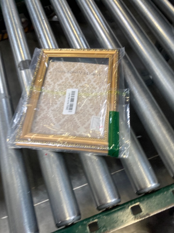 Photo 1 of VIOLABBEY 11x14 Picture Frame Gold, Vintage Photo Frame for Wall or Tabletop Display, Classic Design for Office Home Decor, Fits 11x14 Pictures