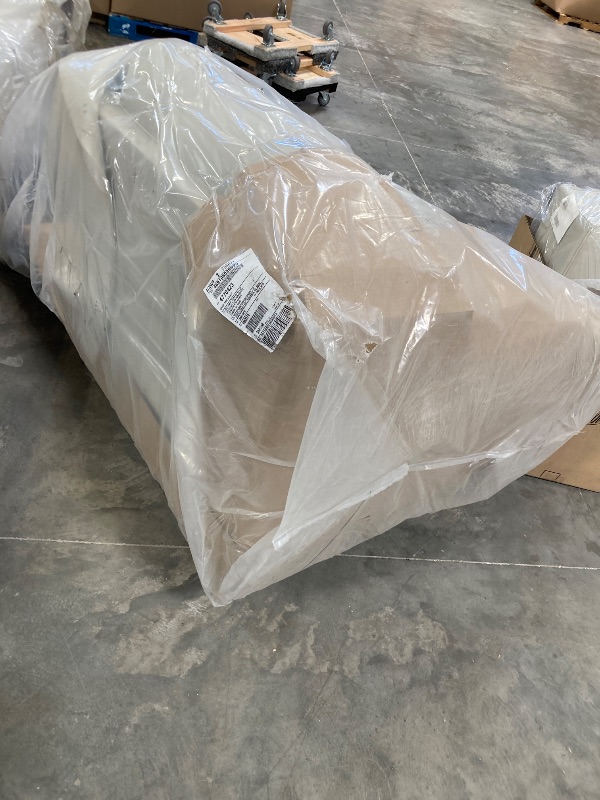 Photo 1 of 4770423 Ashley Furniture Genoa Oversized Chair WITH -----Signature Design by Ashley Genoa Contemporary Chic Leather Ottoman, Cream-----FACTORY SEALED ---PLEASE BRING A TRUCK UPON PICK UP ITEMS ARE XL 

