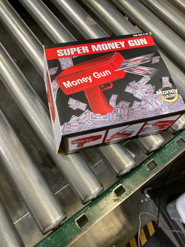 Photo 1 of Prop Gold Money Shooter Gun that Look Real - Fake Money Gun,Fake Cash Gun that can Scatter Money Like rain, for Parties, Wedding.
