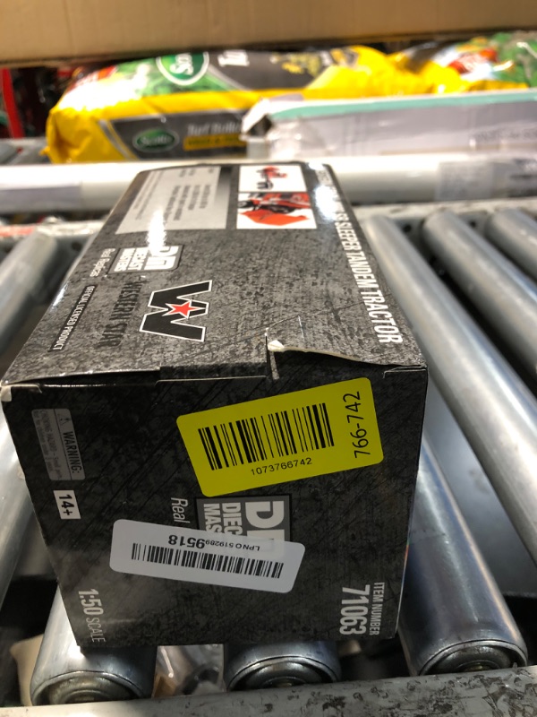 Photo 1 of *MISSING PARTS*Diecast Masters Western Star 4900 SB Sleeper Tandem Tractor- Metallic-Orange cab with Black Stripes 1/50