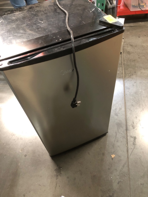 Photo 1 of ***Missing Inside Shelves *** Midea MERM33S1AST Mini Fridge, 3.3 Cu.ft Compact Fridge with Internal Light, Adjustable Thermostat, Reversible Door, Low Noise for Dorm, Office, Bedroom, Stainless Steel