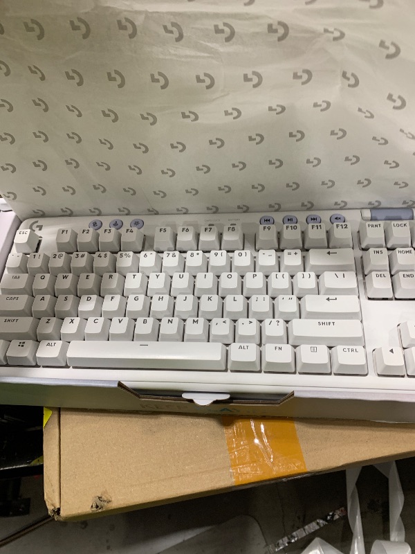 Photo 1 of Logitech G715 Wireless Mechanical Gaming Keyboard with LIGHTSYNC RGB, Lightspeed, Clicky Switches (GX Blue), and Keyboard Palm Rest, PC/Mac Compatible - White Mist