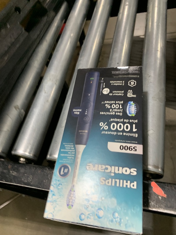 Photo 1 of Philips Sonicare 5900 Series Electric Toothbrush - Next-Generation Sonicare Technology, Pressure Sensor, 6 Brushing Settings, SmarTimer, BrushPacer, 21-Day Runtime, Navy Blue, Model HX7133/02