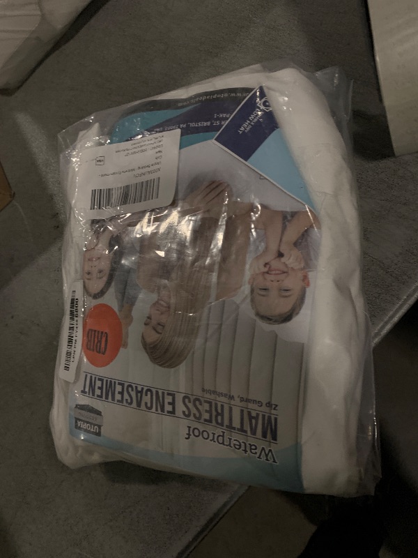 Photo 1 of Utopia Bedding Mattress Protector Zippered Crib Size, 100% Waterproof Bed Bug and Dust Mite Proof Mattress Encasement, Absorbent 6 Sided Mattress Cover