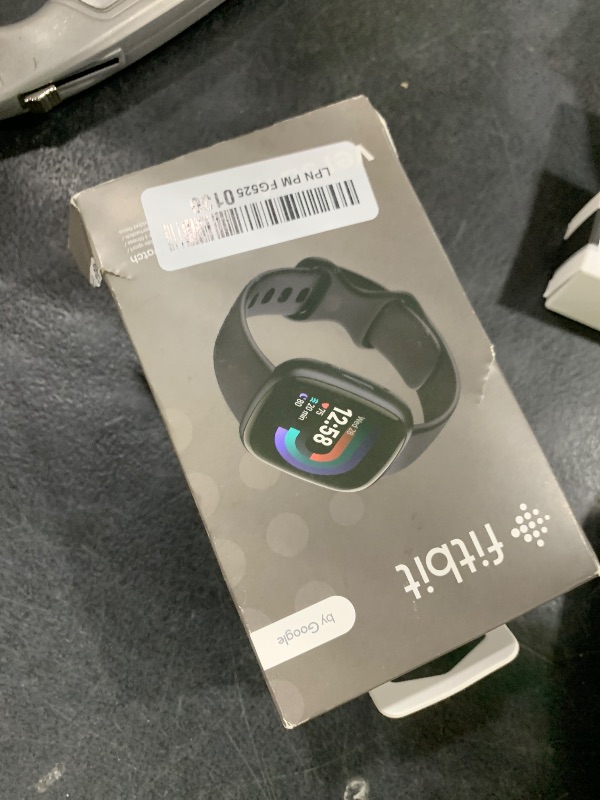 Photo 1 of Fitbit Versa 4 Fitness Smartwatch with Daily Readiness, GPS, 24/7 Heart Rate, 40+ Exercise Modes, Sleep Tracking and more, Black/Graphite, One Size (S & L Bands Included)