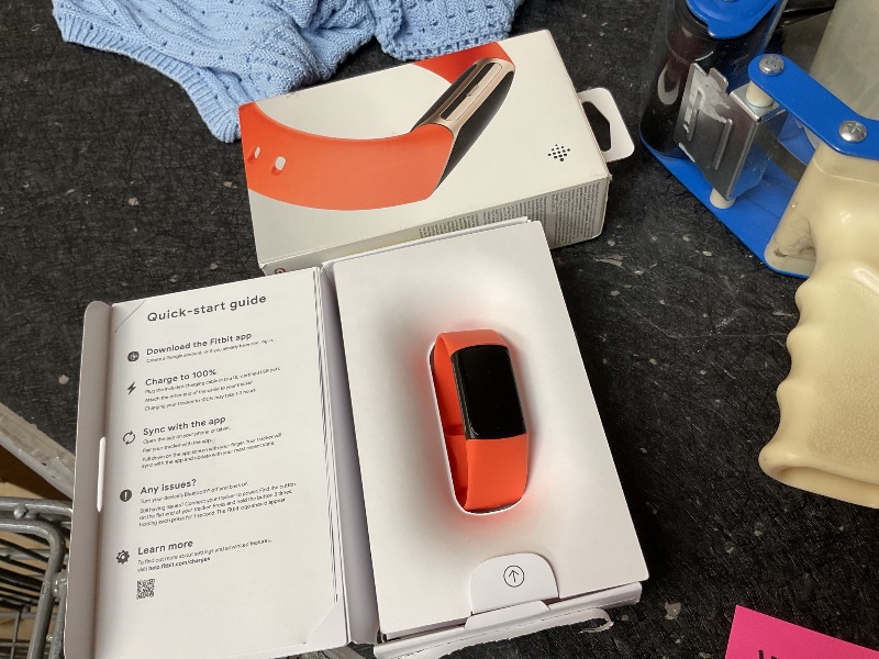 Photo 1 of Fitbit Charge 6 Fitness Tracker with Google apps, Heart Rate on Exercise Equipment, 6-Months Premium Membership Included, GPS, Health Tools and More, Gold/Coral, One Size (S & L Bands Included)