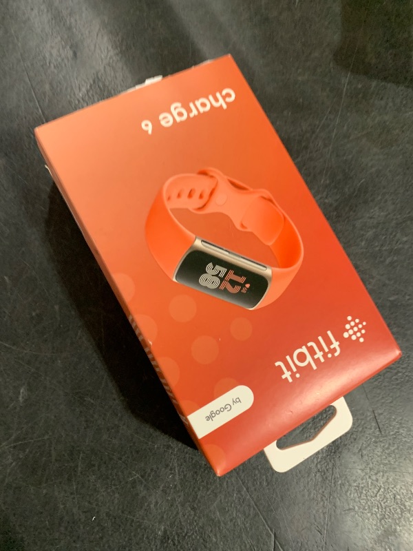 Photo 1 of Fitbit Charge 6 Fitness Tracker with Google apps, Heart Rate on Exercise Equipment, 6-Months Premium Membership Included, GPS, Health Tools and More, Gold/Coral, One Size (S & L Bands Included)