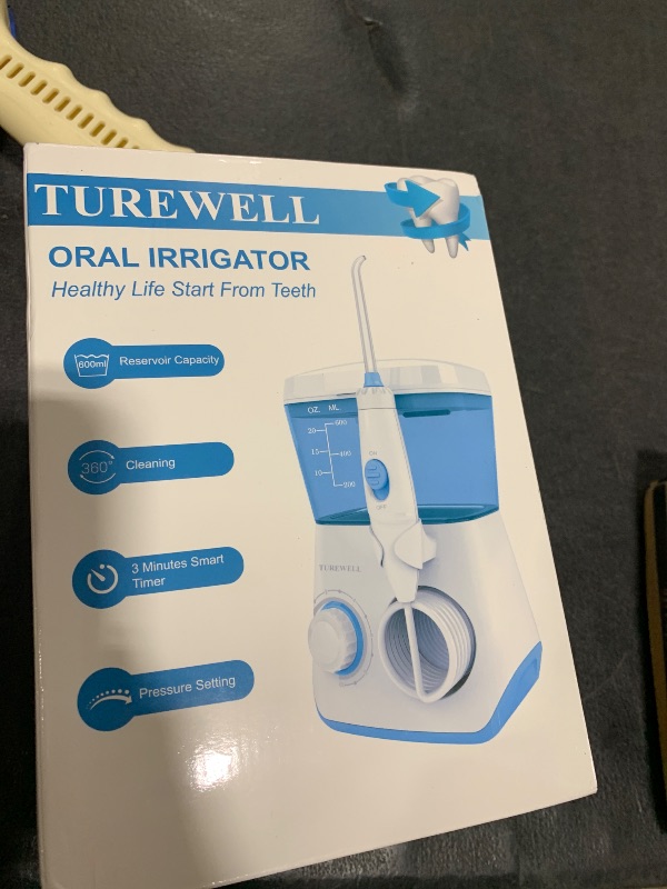 Photo 1 of TUREWELL Water Flossing Oral Irrigator, 600ML Dental Cleaner 10 Adjustable Pressure, Electric Oral Flosser for Teeth/Braces, 8 Replacement Jet Tips for Family (White)