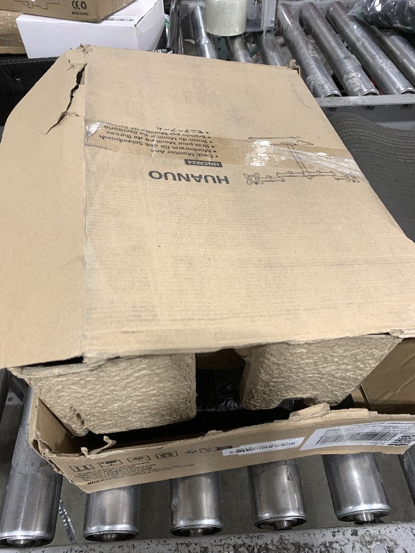 Photo 1 of HUANUO Freestanding Dual Monitor Stand, 32 Inch Dual Monitor Mount for 2 Screens, Holds up to 19.8 lbs per Arm, Gaming Monitor Arm Riser with Tempered-Glass Base, Tilt, Swivel, Rotation, Black