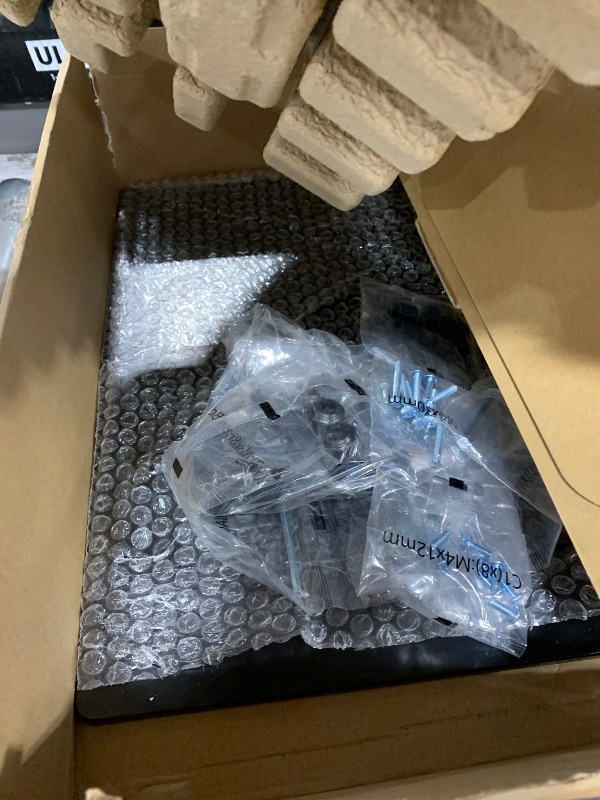 Photo 1 of HUANUO Freestanding Dual Monitor Stand, 32 Inch Dual Monitor Mount for 2 Screens, Holds up to 19.8 lbs per Arm, Gaming Monitor Arm Riser with Tempered-Glass Base, Tilt, Swivel, Rotation, Black