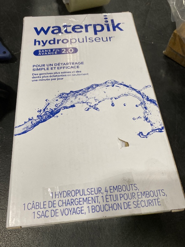 Photo 1 of Waterpik Cordless Advanced 2.0 Water Flosser For Teeth, Gums, Braces, Dental Care With Travel Bag and 4 Tips, ADA Accepted, Rechargeable, Portable, and Waterproof, Blue WP-583, Packaging May Vary