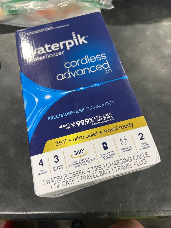 Photo 1 of Waterpik Cordless Advanced 2.0 Water Flosser For Teeth, Gums, Braces, Dental Care With Travel Bag and 4 Tips, ADA Accepted, Rechargeable, Portable, and Waterproof, Gray WP-587, Packaging May Vary
