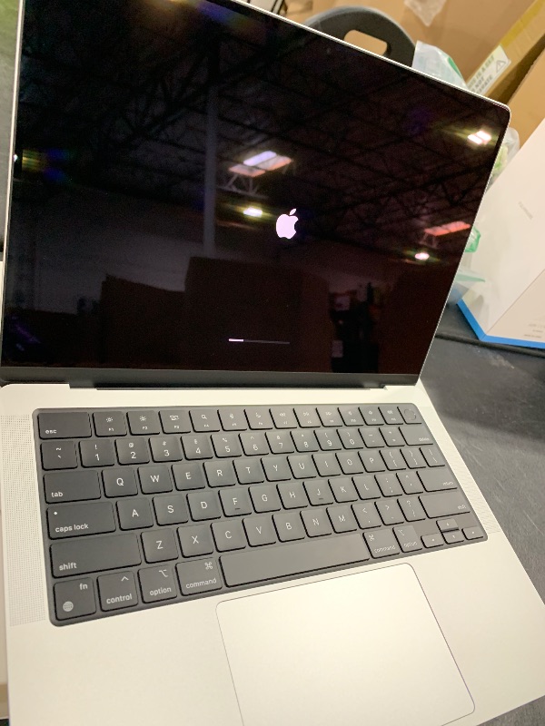 Photo 1 of Apple 2024 MacBook Pro Laptop with M4 chip with 10?core CPU and 10?core GPU: Built for Apple Intelligence, 14.2-inch Liquid Retina XDR Display, 24GB Unified Memory, 1TB SSD Storage; Silver