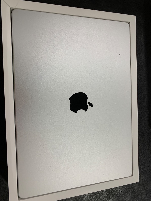 Photo 1 of Apple 2024 MacBook Pro Laptop with M4 chip with 10?core CPU and 10?core GPU: Built for Apple Intelligence, 14.2-inch Liquid Retina XDR Display, 24GB Unified Memory, 1TB SSD Storage; Silver
