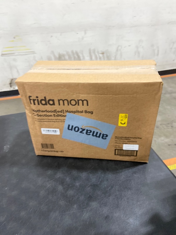 Photo 1 of Frida Mom 30pc Pre-Packed Hosptial & Baby Essentials Travel Bag, Includes C-Section Delivery & Recovery Must Haves, & Newborn Grooming Kit, Easy to Organize, Removable Toiletry Bags & Suitcase Strap