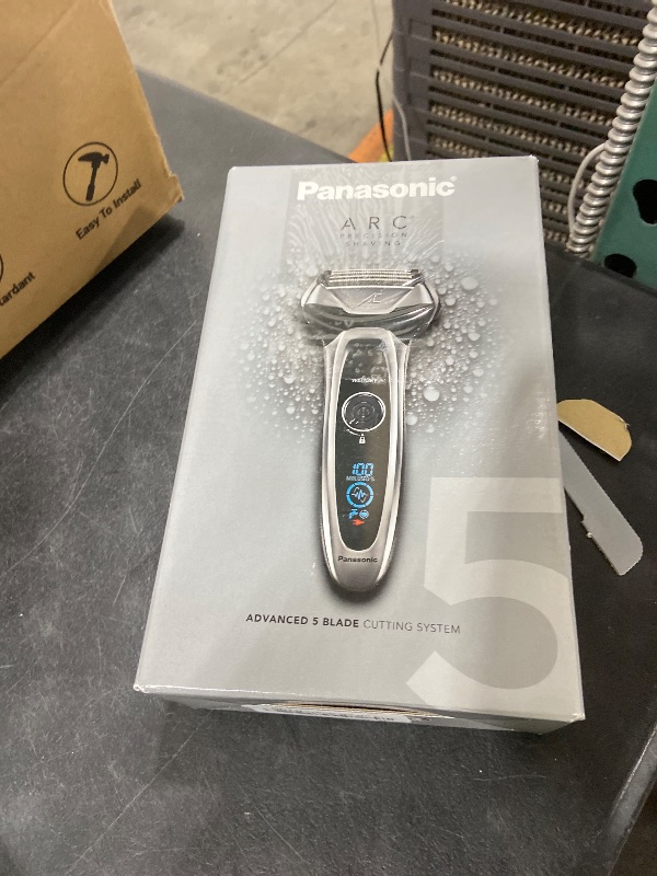 Photo 1 of Panasonic ARC5 Electric Razor for Men with Pop-Up Trimmer, Wet/Dry 5-Blade Electric Shaver with Intelligent Shave Sensor and Multi-Flex Pivoting Head – ES-LV65-S (Silver)
