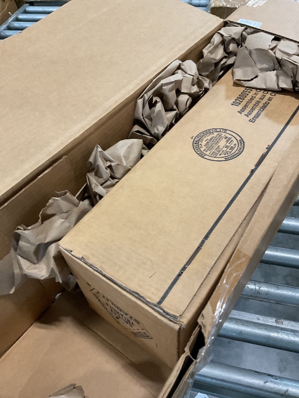 Photo 1 of ** FACTORY SEALED ** Monroe Quick-Strut 171128R Suspension Strut and Coil Spring Assembly for Dodge Grand Caravan
