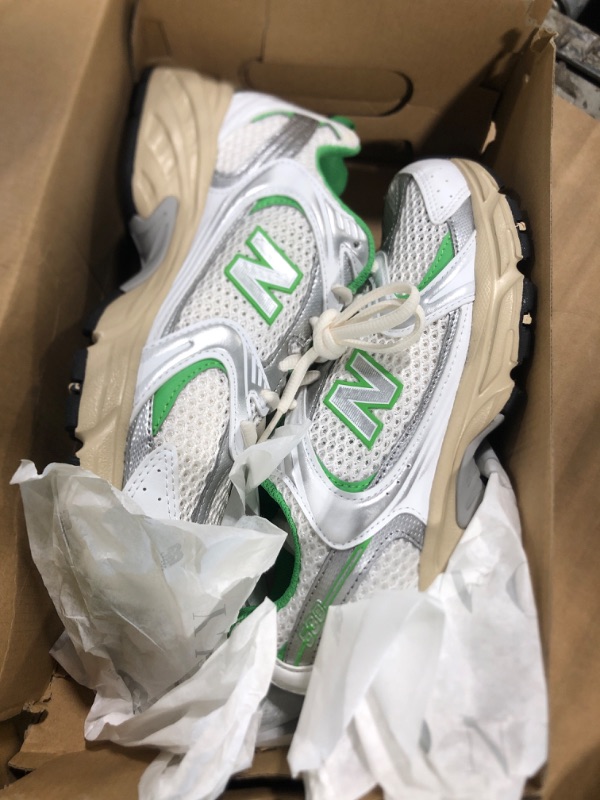 Photo 1 of ****SIMILAR ITEM PLEASE SEE THE PICTURES****New Balance Unisex 530 Silver Metallic/Green Apple (Men 7.5 Medium Women 9 Medium)