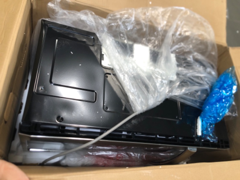 Photo 1 of ****BROKEN MICROWAVE PLATE****
BLACK+DECKER Over the Range Microwave Oven with Vent and One-Touch Auto Cooking, 1.7 cu. ft. OTR Over Stove Microwave, Stainless Steel, 1000 Watts, EM044K6CE-SS