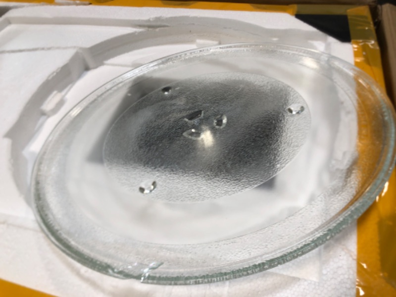 Photo 1 of ****BROKEN MICROWAVE PLATE****
BLACK+DECKER Over the Range Microwave Oven with Vent and One-Touch Auto Cooking, 1.7 cu. ft. OTR Over Stove Microwave, Stainless Steel, 1000 Watts, EM044K6CE-SS