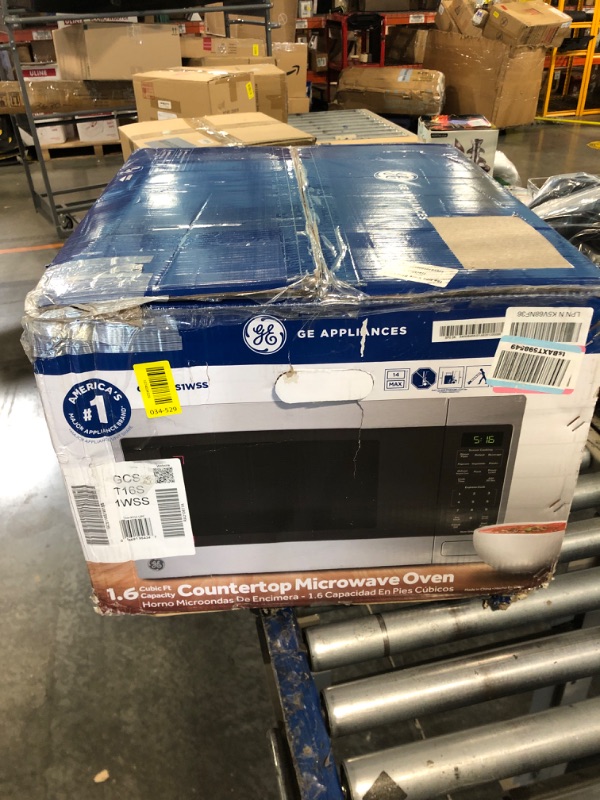 Photo 1 of ****CHECKED  7/11 - AS IS/NO RETURNS - SALE FINAL - FOR PARTS ONLY****GE Countertop Microwave Oven, 1,150-watt Capacity, 1.6 Cubic Ft., 8 Auto Setting Cooking Settings, Child-Lock Technology, Kitchen Essentials for the Countertop, Dorm Room or Apartment, 