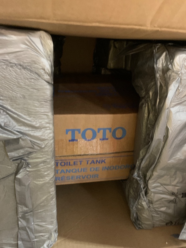 Photo 1 of ***FACTORY SEALED*** TOTO® Aquia® IV Two-Piece Elongated Dual Flush 1.28 and 0.9 GPF Toilet with CEFIONTECT, Cotton White - CST446CEMFGN#01