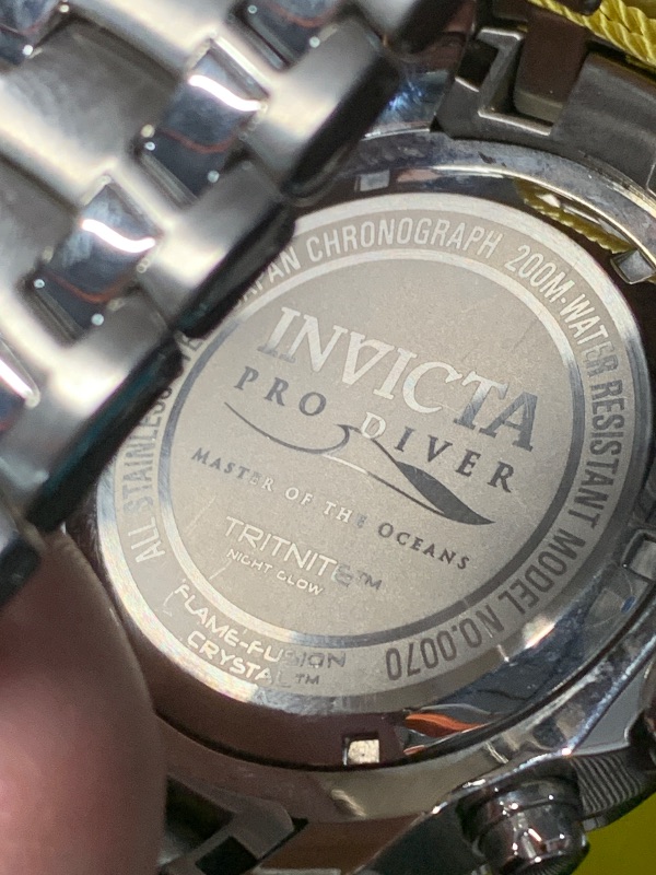 Photo 1 of ***Looks like there may be some water damage***For Parts***
Invicta Men's 0070 "Pro Diver Collection" Stainless Steel and Blue Dial Watch