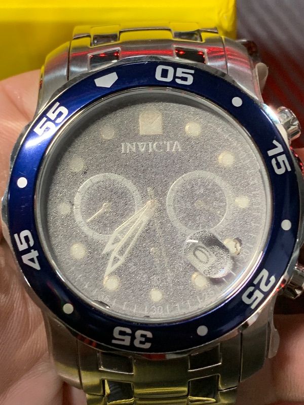Photo 1 of ***Looks like there may be some water damage***For Parts***
Invicta Men's 0070 "Pro Diver Collection" Stainless Steel and Blue Dial Watch
