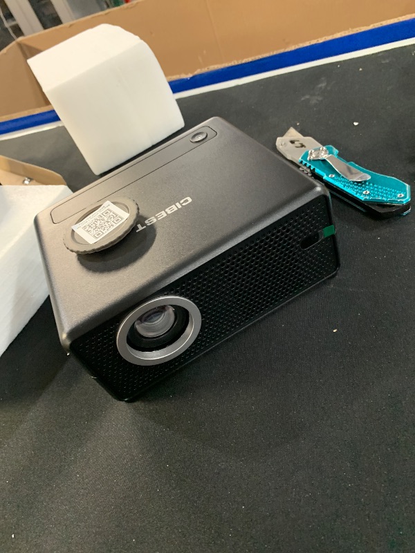 Photo 1 of ***MISSING CORDS***
CiBest Mini Projector with WiFi and Bluetooth, Compatible with Netflix/YouTube/PrimeVideo, Electric Focus & Keystone, Short Throw Full HD 1080P Video Projector, Portable Outdoor/Indoor Use