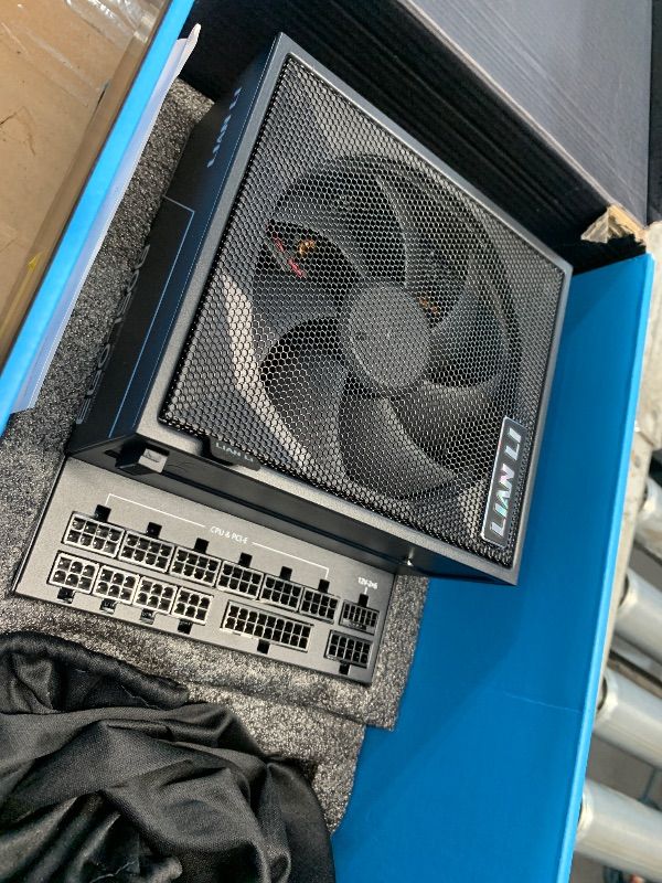 Photo 1 of *** INCOMPATIBLE CABLES, MISSING POWER CORD*** Lian Li EDGE750W Fully Modular Low-Noise ATX Power Supply - ATX 3.1 & PCIE 5.1 Compliant - Cybenetics Gold Efficiency - 12V-2x6 Cable - L-Shape Design - Without USB/Fan Hub - Black (EG0750G.B)