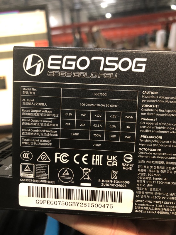 Photo 1 of *** INCOMPATIBLE CABLES, MISSING POWER CORD*** Lian Li EDGE750W Fully Modular Low-Noise ATX Power Supply - ATX 3.1 & PCIE 5.1 Compliant - Cybenetics Gold Efficiency - 12V-2x6 Cable - L-Shape Design - Without USB/Fan Hub - Black (EG0750G.B)