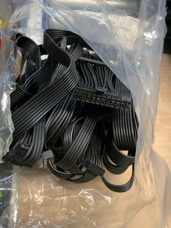 Photo 1 of *** INCOMPATIBLE CABLES, MISSING POWER CORD*** Lian Li EDGE750W Fully Modular Low-Noise ATX Power Supply - ATX 3.1 & PCIE 5.1 Compliant - Cybenetics Gold Efficiency - 12V-2x6 Cable - L-Shape Design - Without USB/Fan Hub - Black (EG0750G.B)