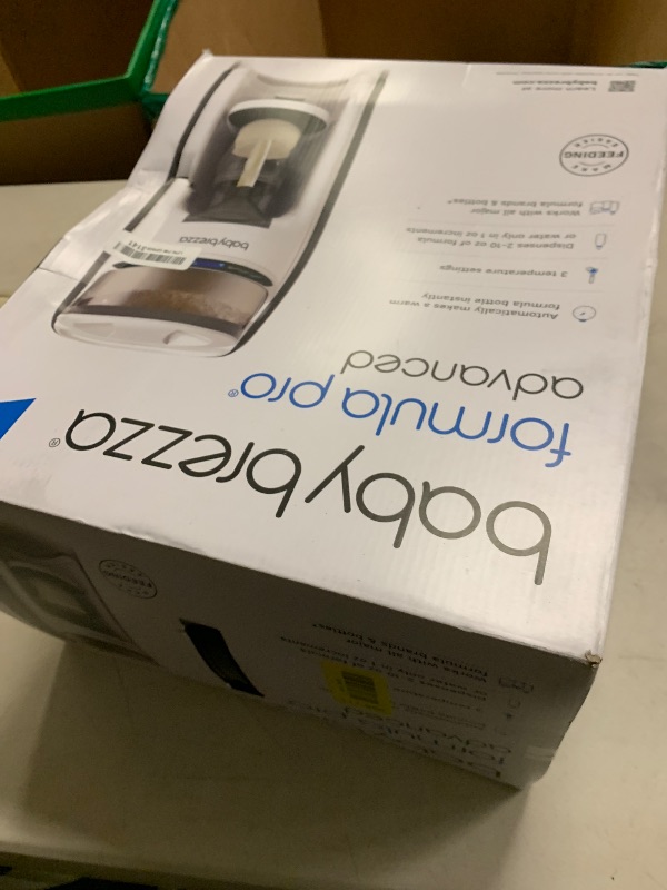 Photo 1 of Baby Brezza New and Improved Formula Pro Advanced Formula Dispenser Machine - Automatically Mix a Warm Formula Bottle Instantly - Easily Make Bottle with Automatic Powder Blending, White
