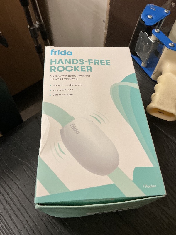 Photo 1 of Frida Baby Hands-Free Stroller Device with 5 Vibration Levels, Universal Stroller Accessories, Rechargeable Portable Vibration for Cribs & Strollers, Water-Resistant Baby Soother