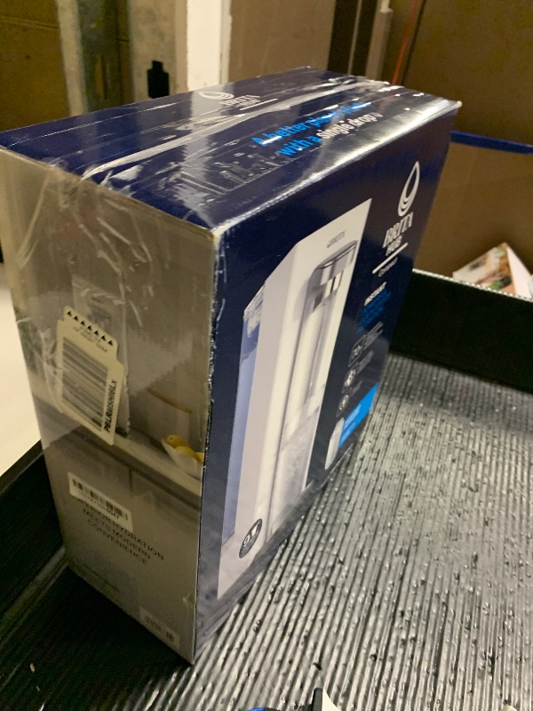 Photo 1 of Brita Hub Compact Instant Powerful Countertop Water Filter System, Reduces 70+ Contaminants, 9 Cup Water Reservoir, Includes 6 Month Carbon Block Filter, White, 87344