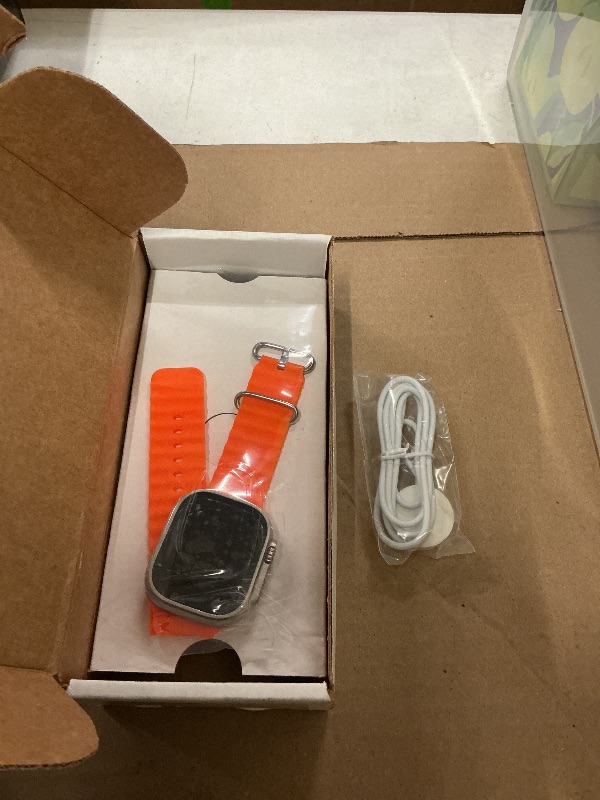 Photo 1 of Apple Watch Ultra 2 [GPS + Cellular, 49mm] - Titanium Case with Orange Ocean Band, One Size (Renewed)