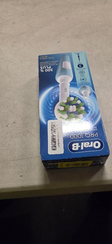 Photo 1 of Oral-B Pro 1000 CrossAction Electric Toothbrush, Green