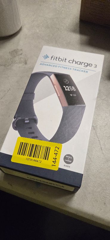 Photo 1 of Fitbit Charge 3 Fitness Activity Tracker, Rose Gold/Blue Grey, One Size (S and L Bands Included)