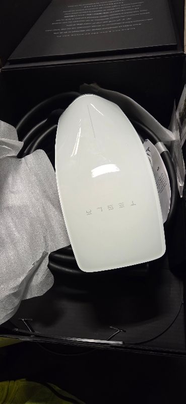 Photo 1 of Tesla Universal Wall Connector - Electric Vehicle (EV) Charger with Dual Plug Type - Compatible for All North American EVs - Level 2 - up to 48A with 24' Cable