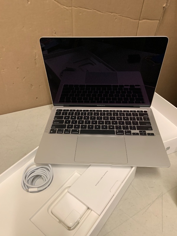 Photo 1 of 2020 Apple MacBook Air Laptop: Apple M1 Chip, 13” Retina Display, 8GB RAM, 256GB SSD Storage, Backlit Keyboard, FaceTime HD Camera, Touch ID. Works with iPhone/iPad; Silver