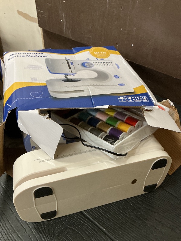 Photo 1 of Stoigeld Sewing Machine for Beginners with 20Pcs Fabric & 32Pcs Sewing Threads Kit,Portable Sewing Machine with 12 Built-in Stitches & 2 Speed(High-Low Speeds)-SM-725