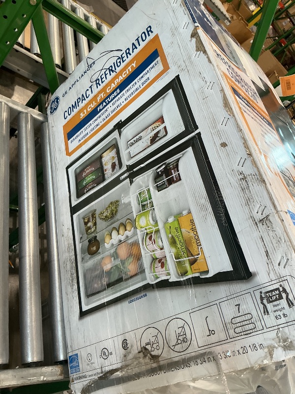 Photo 1 of **parts only** GE Double-Door Mini Fridge, Freestanding Compact Refrigerator with Freezer, 3.1 Cu Ft, Black, GDE03GGKBB