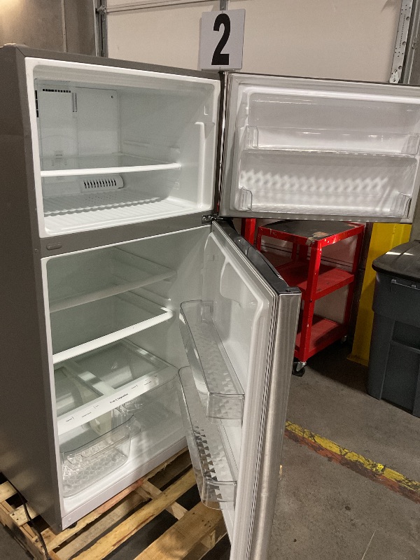 View 7 of ***MAJOR DAMAGE HEAVILY USED TRUCK OR TRIALER PICKUP ONLY***
30 in. 20 cu. ft. Top Freezer Refrigerator in Stainless Steel, Energy Star, Garage Ready