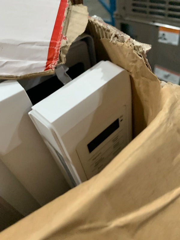 Photo 1 of ***MAJOR DAMAGE FOR PARTS ONLY***
GE Countertop Microwave Oven, Compact 0.9 Cubic Ft., 900-watt Capacity, 7 Auto Cooking Settings, Child-Lock Technology, Kitchen Essentials for The Countertop, Dorm Room or Apartment, White