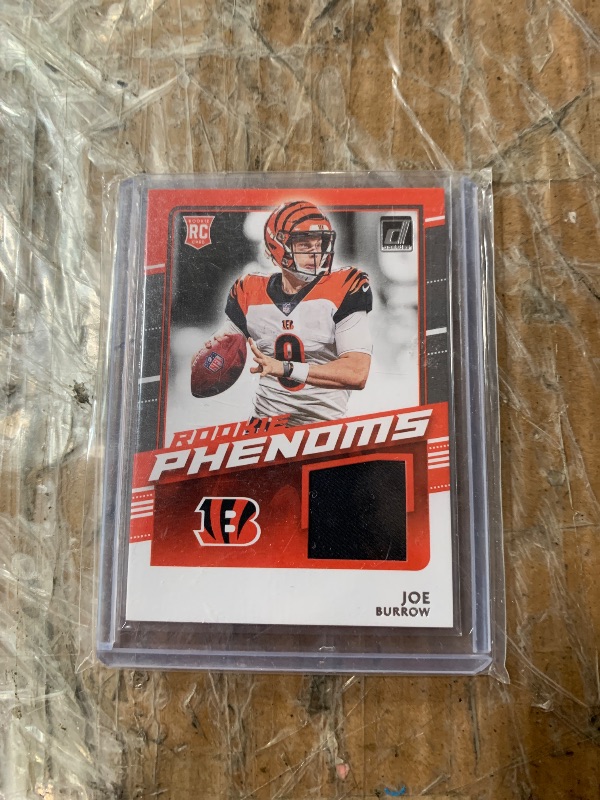 Photo 1 of 2020 Panini Donruss - Rookie Phenoms Jerseys Joe Burrow #RP-JB (MEM, RC)